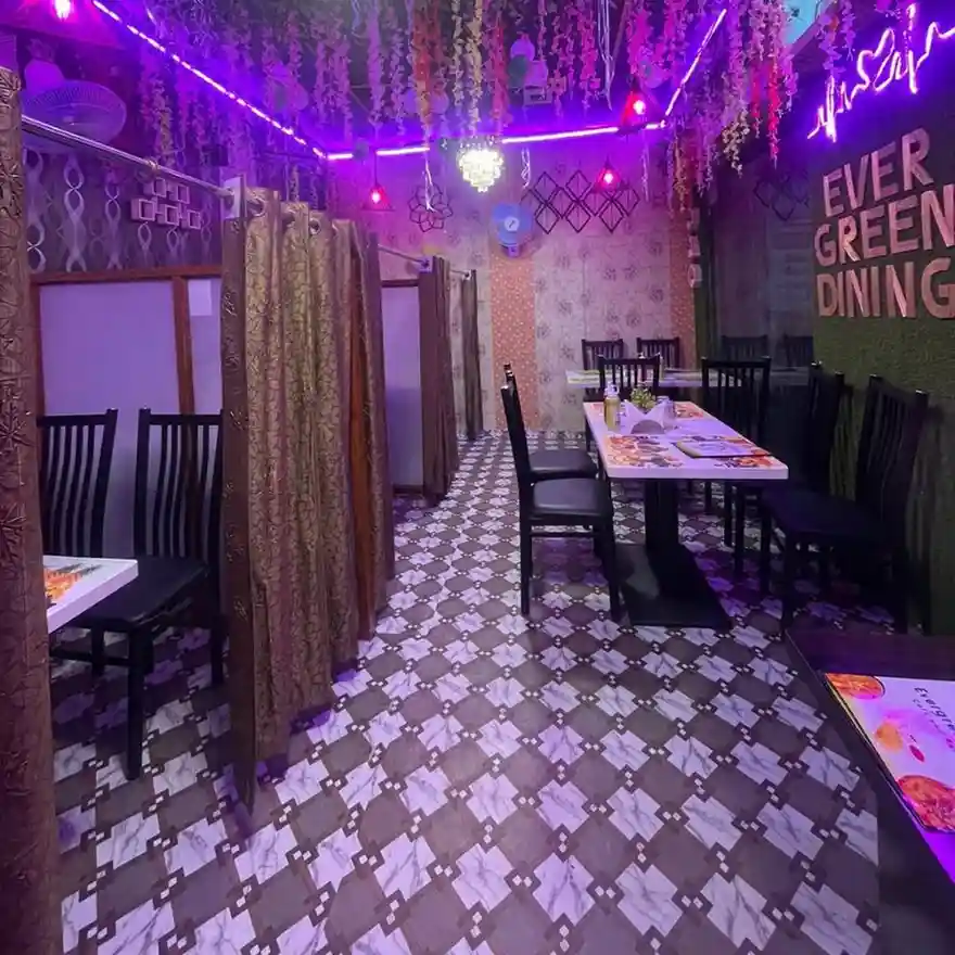 Evergreen Dining Cafe - A cozy and affordable spot for couples in Varanasi.