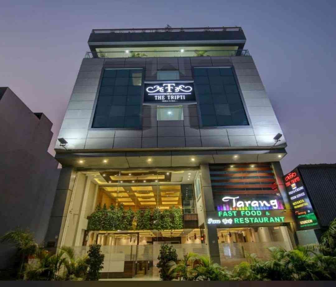 The Tripti Hotel - A budget-friendly Vijay Nagar hotel in Indore with rooftop dining for couples.