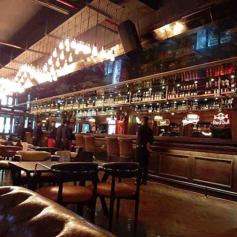 The Flying Saucer Cafe - Spacious bar with craft cocktails and Instagram worthy private booths.