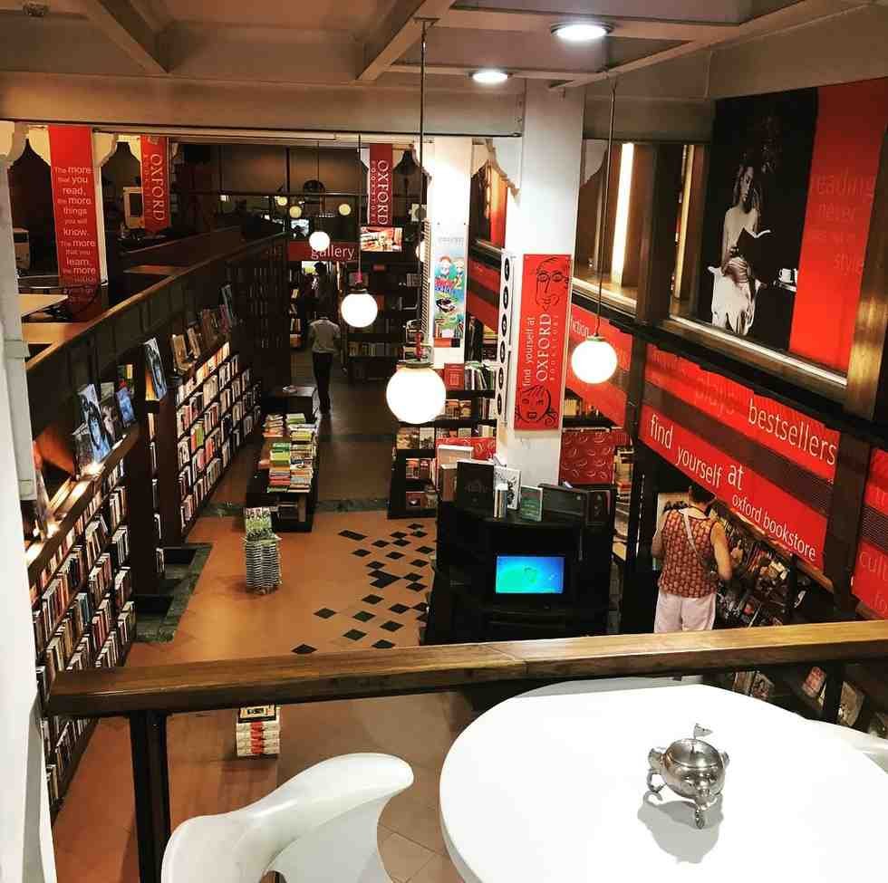 Oxford Bookstore - A literary paradise with Cha Bar cafe perfect for intellectual couples and bookworm dates on Park Street.