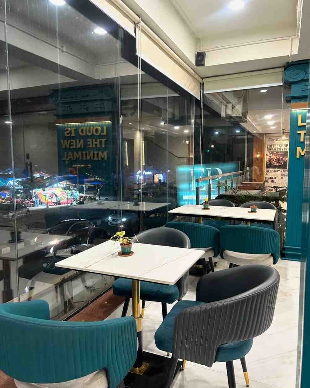 The Evening Post - Cozy cafe with charming decor and attentive staff perfect for couples in Bhopal.