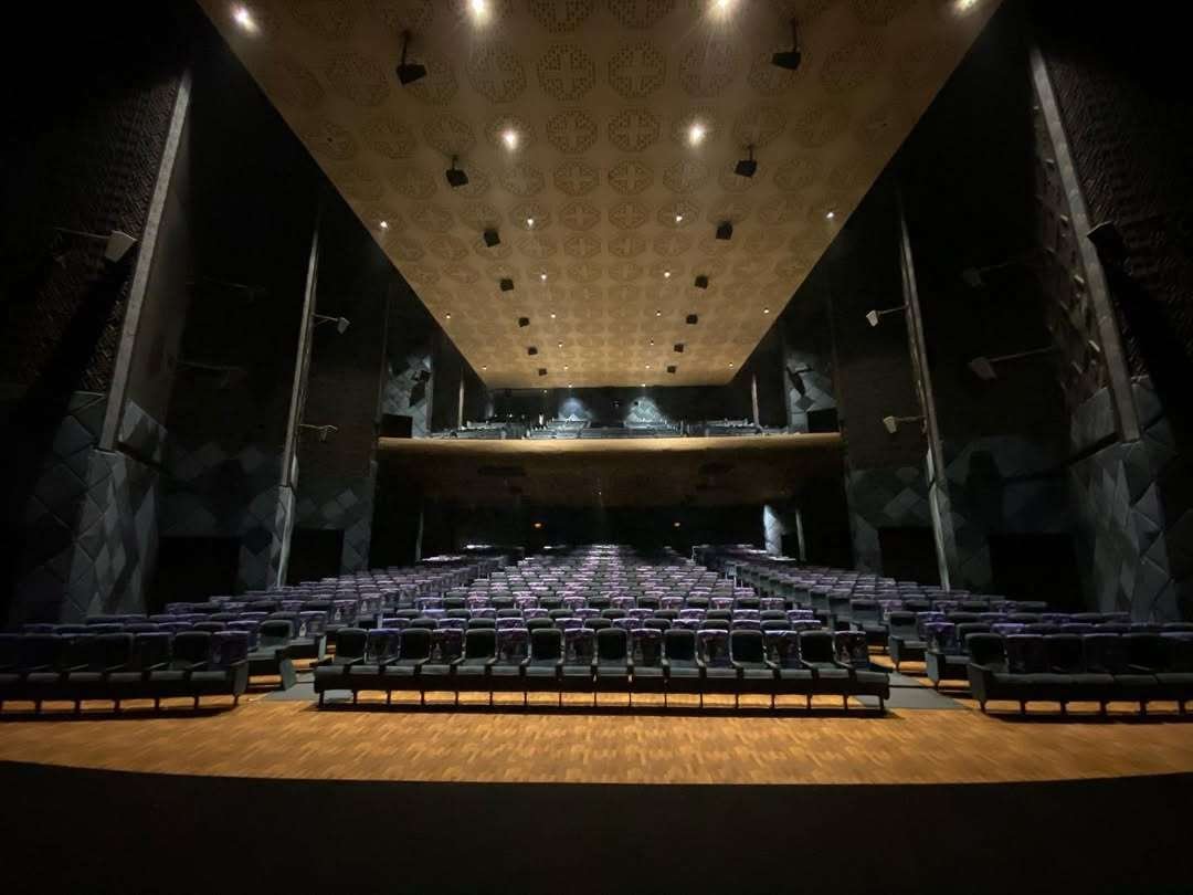 Sangam Cinemas with large screen and dedicated couple sofa seats.