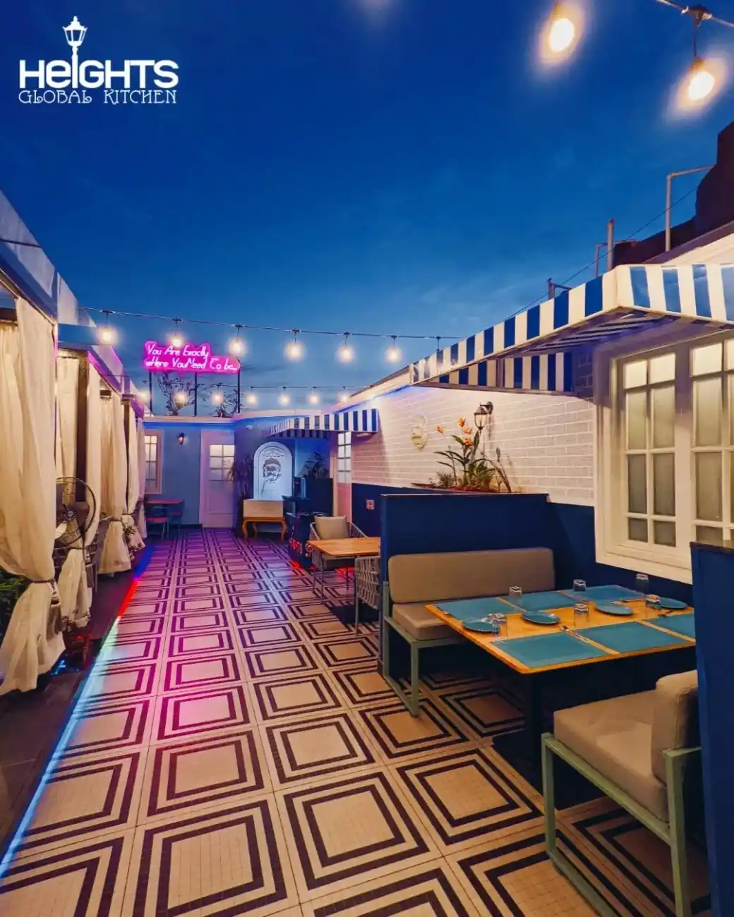 Heights Rooftop Restaurant - Cozy rooftop with city skyline views.