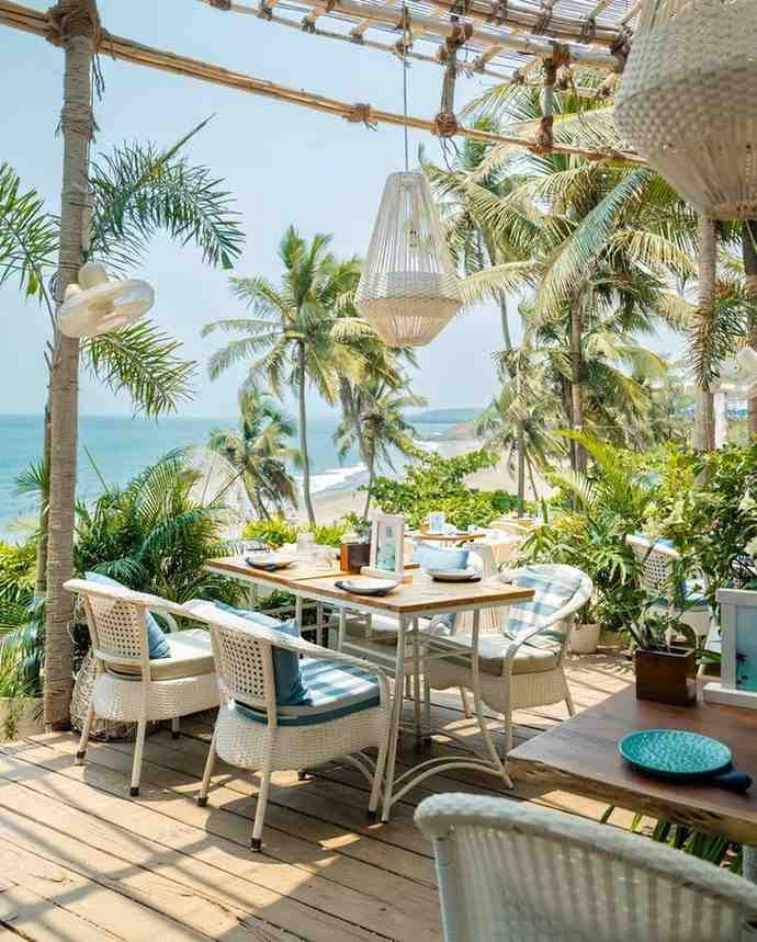 Olive Bar & Kitchen - A chic cliffside restaurant with stunning sunset views.